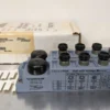 Turck JBBS-57-E811 Passive Junction U0205 8-Port 5-Pin M12 1x5-Pin 7/8" Male (BUS In) 1x5-Pin 7/8" Female (BUS Out)