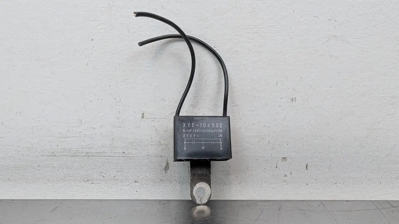 Okaya XYE-104332 Noise Suppression Capacitor 250VAC 0.1µF X2 2X3300pF Y2